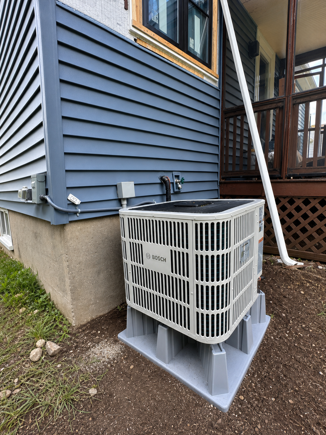 Bosch heat pump outdoor unit installed for Melrose whole home renovation