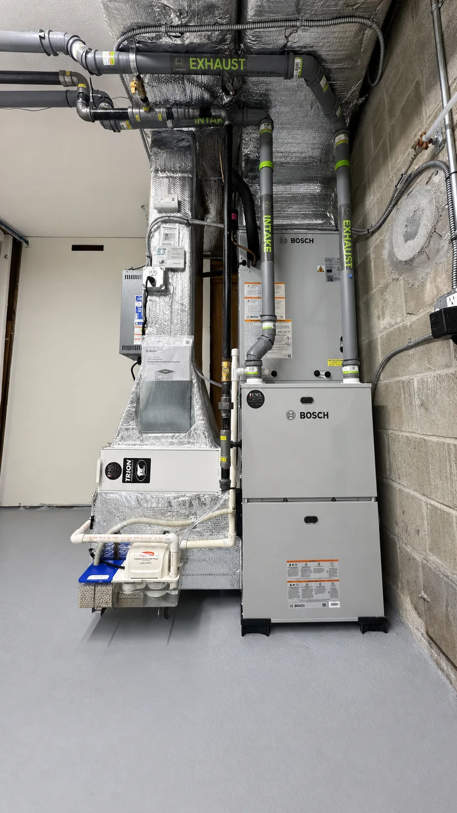 Front view of completed Bosch HVAC system and custom ductwork installation in Stoneham MA