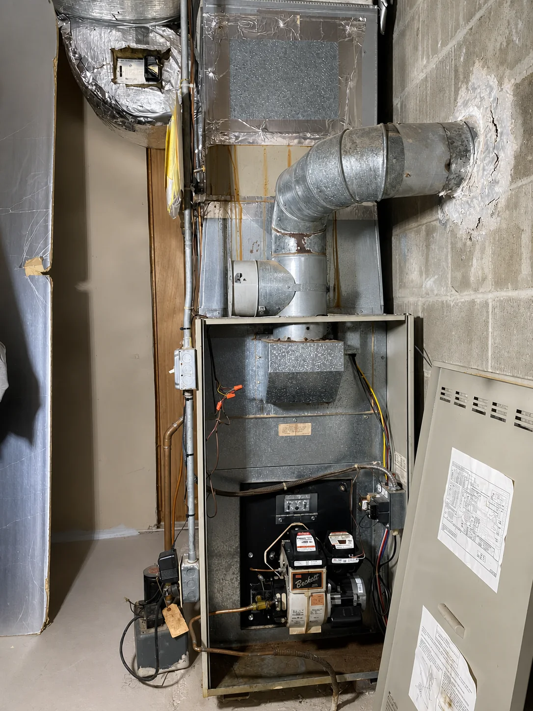 Original HVAC system before replacement in a Stoneham Massachusetts home