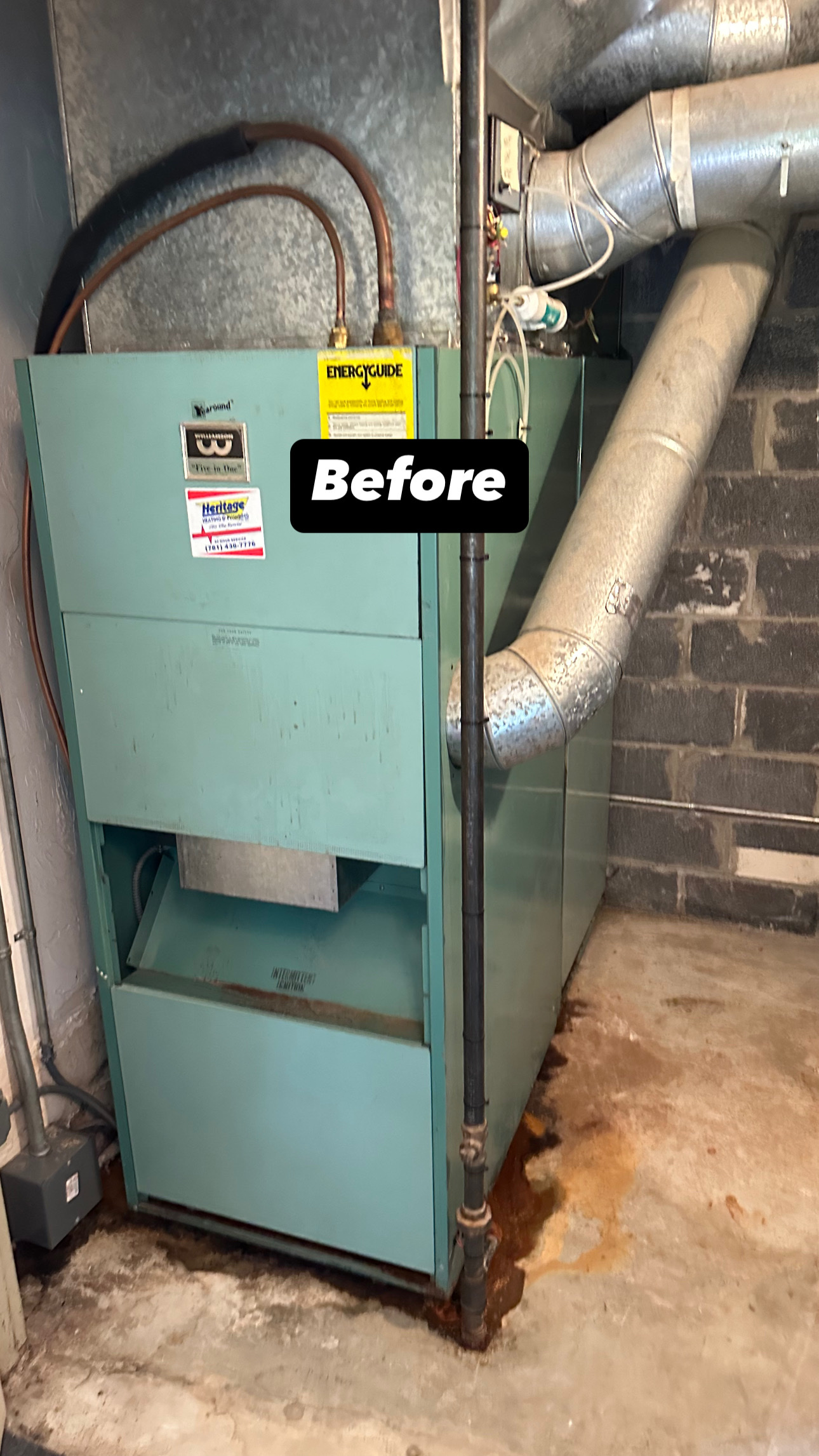 Older furnace before replacement by EML Mechanical