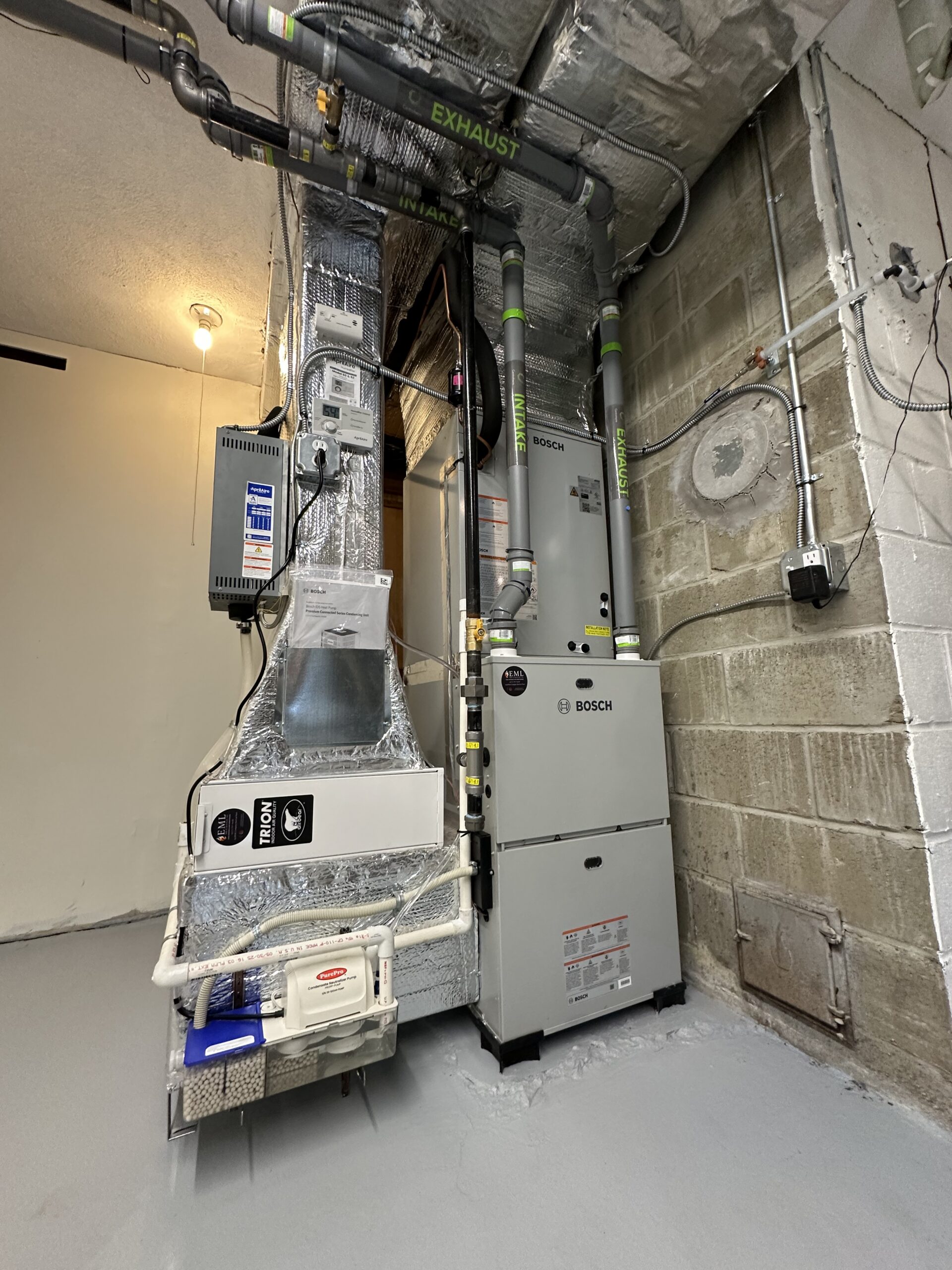 High-efficiency furnace installation by EML Mechanical in Massachusetts