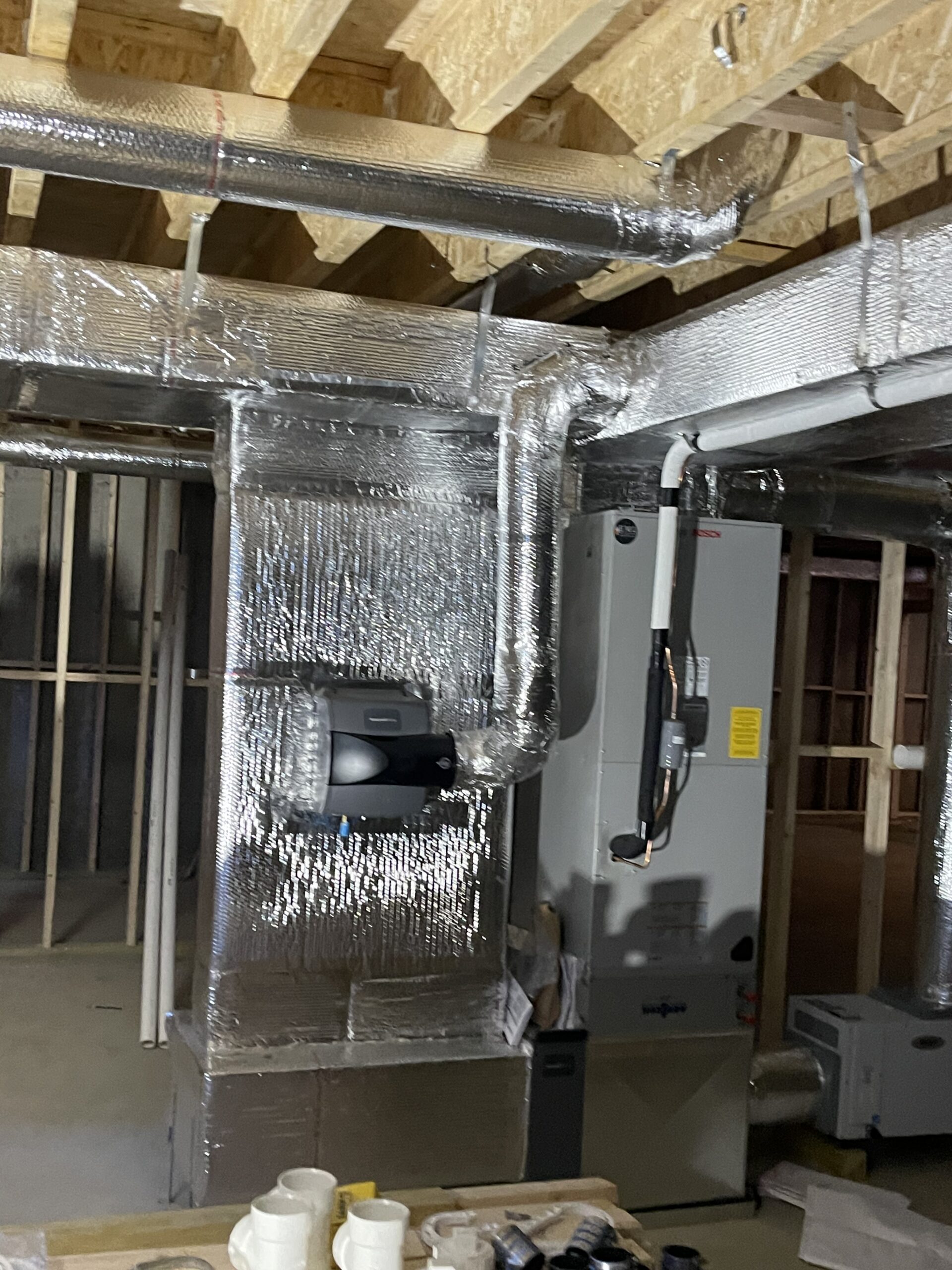 Insulated rectangular ductwork installed in new construction
