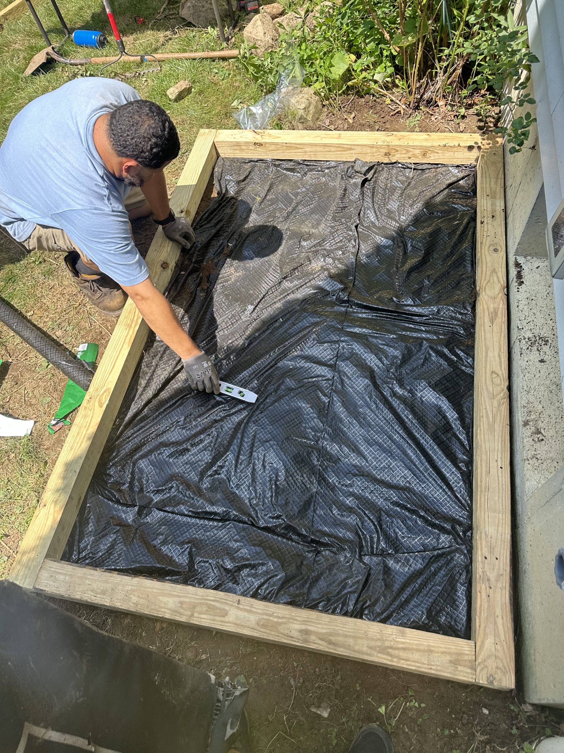 EML Mechanical leveling and preparing a framed central air conditioning equipment base