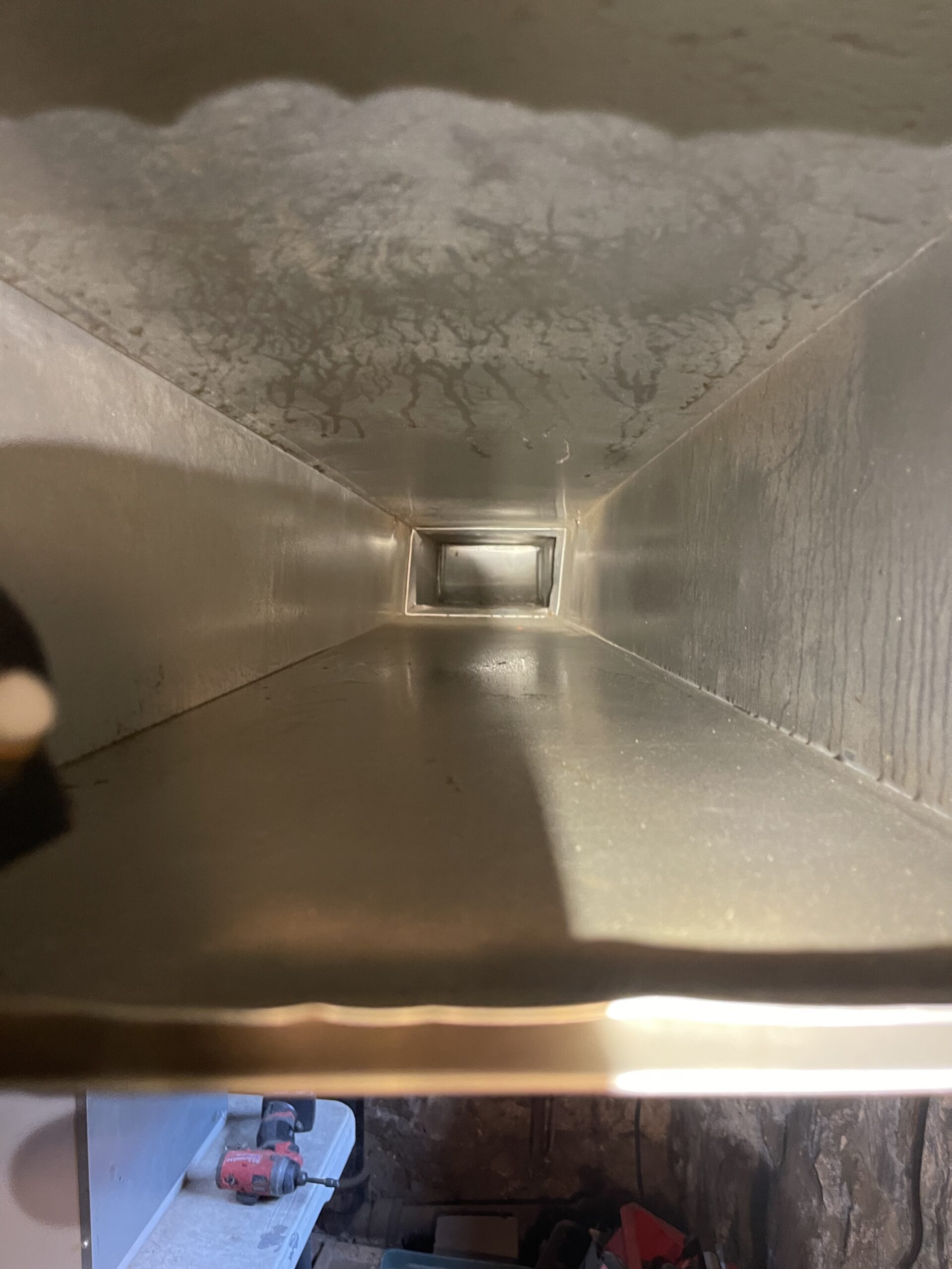 Clean metal air duct after professional duct cleaning by EML Mechanical
